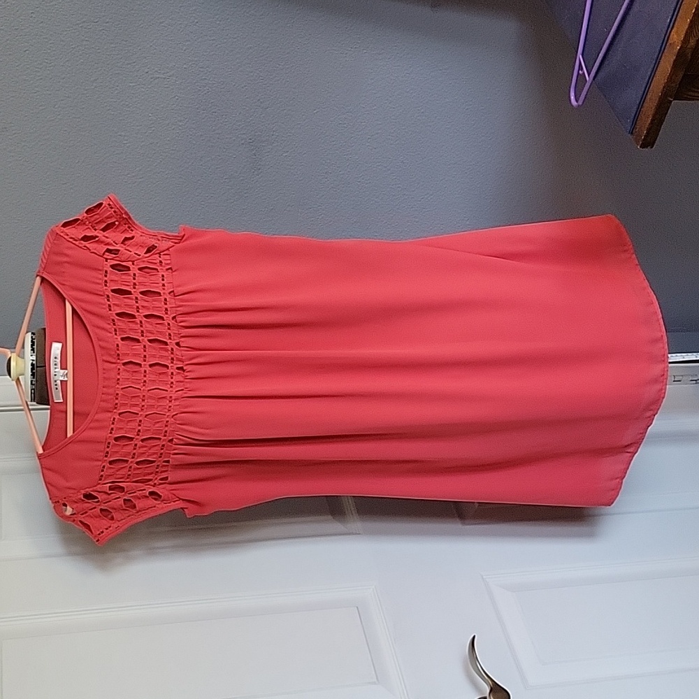 Coral in color dress